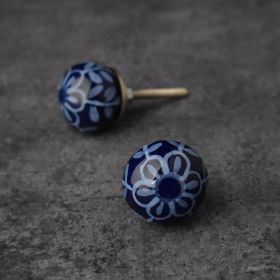 small blue and white ceramic knob